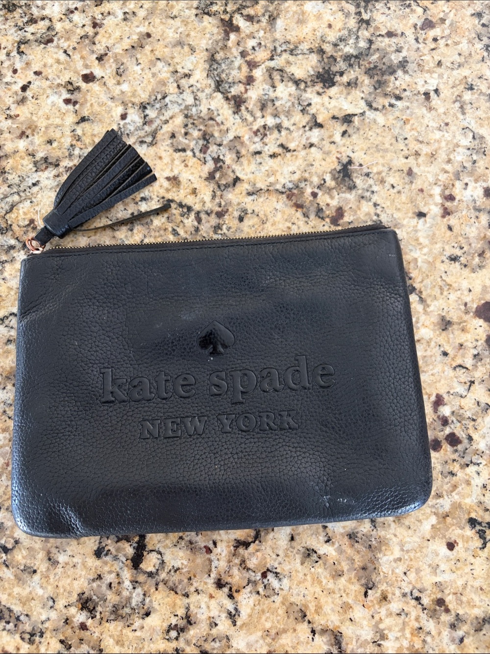 kate spade Black Embossed Leather Zip Pouch with Tassel zipper is broken!